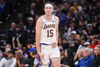 Los Angeles Lakers guard Austin Reaves (15) reacts after making a three point shot against the Sacramento Kings during the fourth quarter at Golden 1 Center.