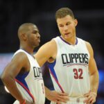 Clippers forward Blake Griffin speaks with guard Chris Paul during a stoppage in play against the Suns during the first half at Staples Center