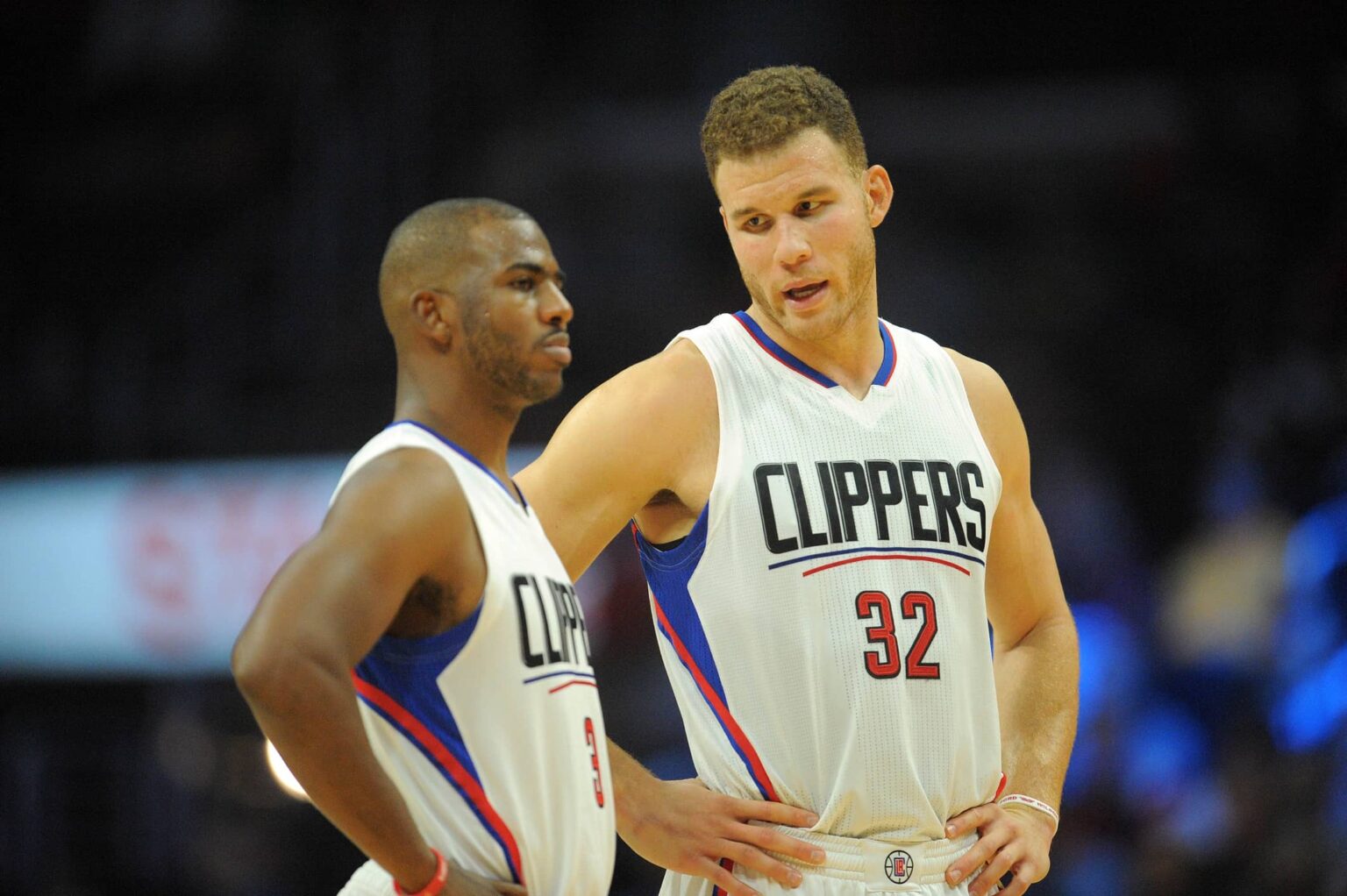 Clippers forward Blake Griffin speaks with guard Chris Paul during a stoppage in play against the Suns during the first half at Staples Center
