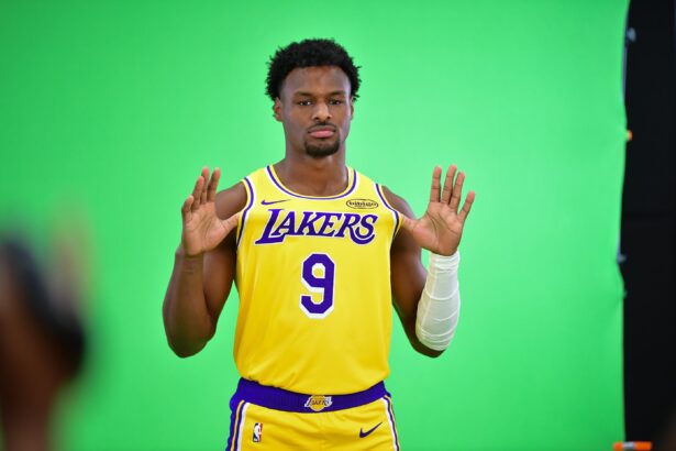 Lakers guard Bronny James poses for photos during media day at UCLA Health Training Center