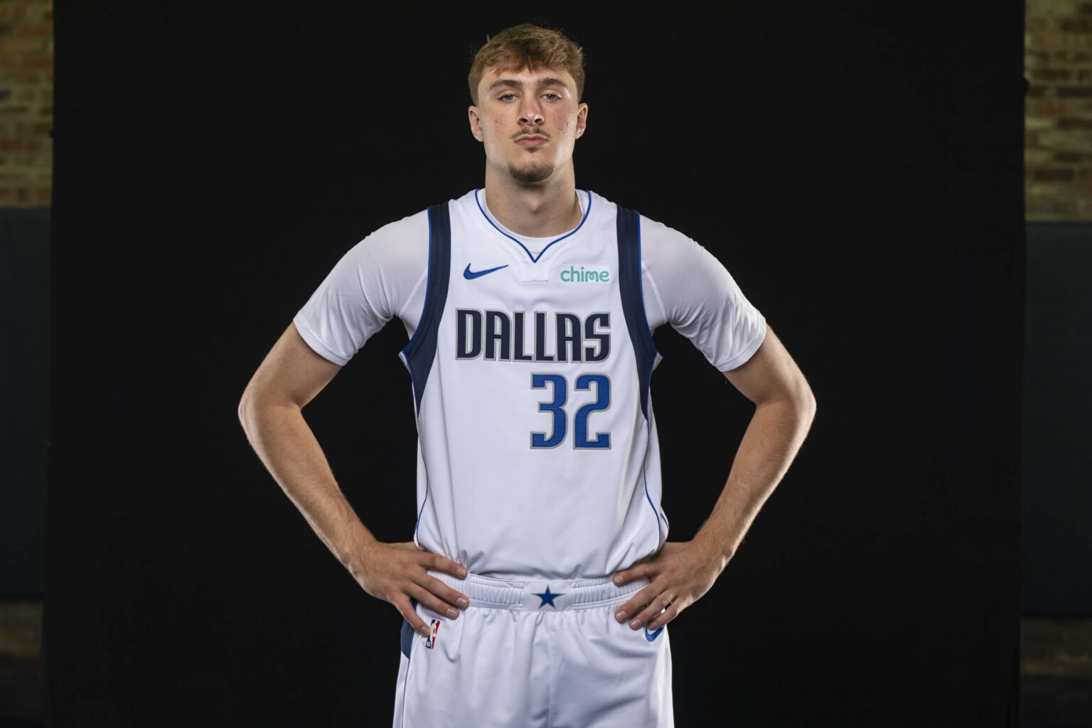 Mavericks forward Cooper Flagg poses for a photo during the Mavericks 2025 media day at the American Airlines Center