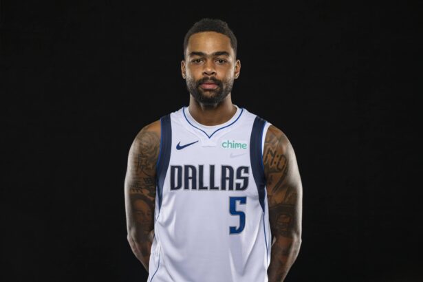 Mavericks guard D'Angelo Russell poses for a photo during the Mavericks 2025 media day at the American Airlines Center