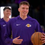Lakers forward Dalton Knecht warms up prior to the game against the Warriors at Crypto.com Arena