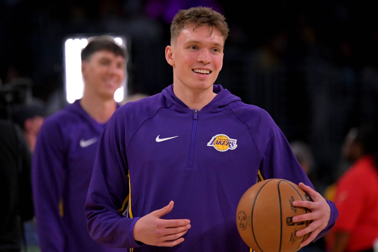 Lakers forward Dalton Knecht warms up prior to the game against the Warriors at Crypto.com Arena