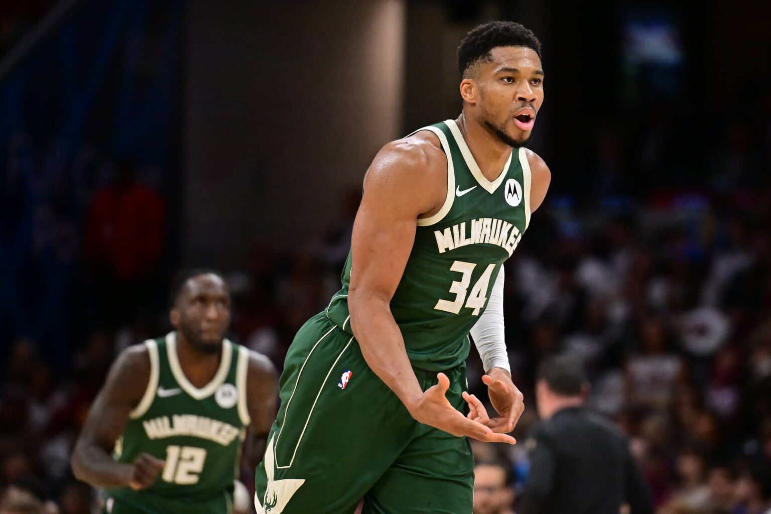 Milwaukee Bucks forward Giannis Antetokounmpo (34) celebrates after hitting a three point basket against the Cleveland Cavaliers during the second half at Rocket Arena.