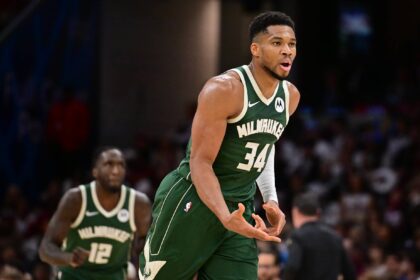 Milwaukee Bucks forward Giannis Antetokounmpo (34) celebrates after hitting a three point basket against the Cleveland Cavaliers during the second half at Rocket Arena.