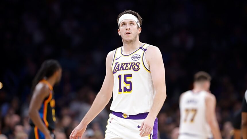 Oklahoma City, Oklahoma, USA; Los Angeles Lakers guard Austin Reaves (15) looks down court against the Oklahoma City Thunder during the second quarter at Paycom Center. Mandatory Credit: Alonzo Adams-Imagn Images