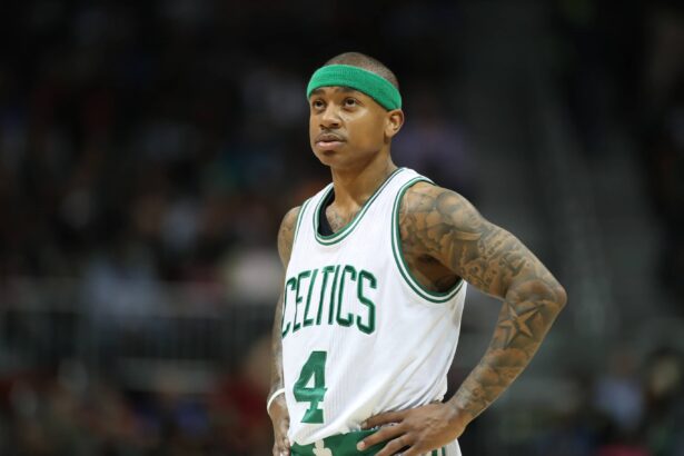 Celtics guard Isaiah Thomas reacts to a play during their game against the Hawks at Philips Arena