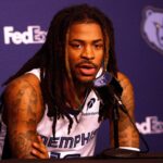 Grizzlies guard Ja Morant speaks to media during a press conference on media day at FedEx. Forum
