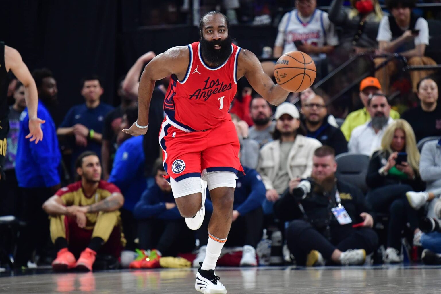 Clippers guard James Harden moves the ball down court against the Cavaliers during the second half at Intuit Dome