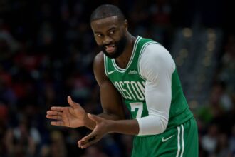 Boston Celtics guard Jaylen Brown reacts during the first half against the New Orleans Pelicans at Smoothie King Center.