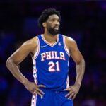 6ers center Joel Embiid looks on during the third quarter against the Celtics at Wells Fargo Center