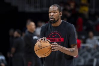 Rockets forward Kevin Durant warms up prior to the game against the Hawks at State Farm Arena
