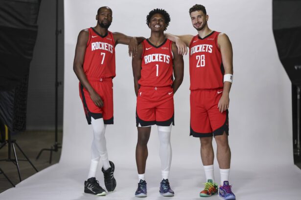 Rockets forward Kevin Durant and forward Amen Thompson and center Alperen Sengun during Houston Rockets media day at Toyota Center