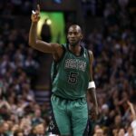 Celtics center Kevin Garnett returns down court against the Toronto Raptors during the second half at the TD Garden