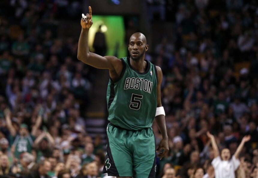Celtics center Kevin Garnett returns down court against the Toronto Raptors during the second half at the TD Garden