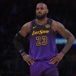 Lakers forward LeBron James looks on in the second half against the Blazers at Crypto.com Arena