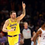 Lakers guard Luka Doncic reacts against the Suns during an NBA preseason game at Mortgage Matchup Center