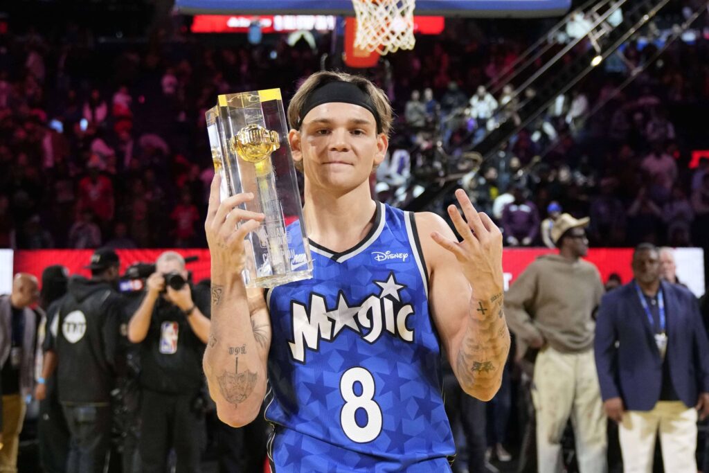 Osceola Magic guard Mac McClung celebrates with the trophy after winning the slam dunk competition during All Star Saturday Night ahead of the 2025 NBA All Star Game at Chase Center.
