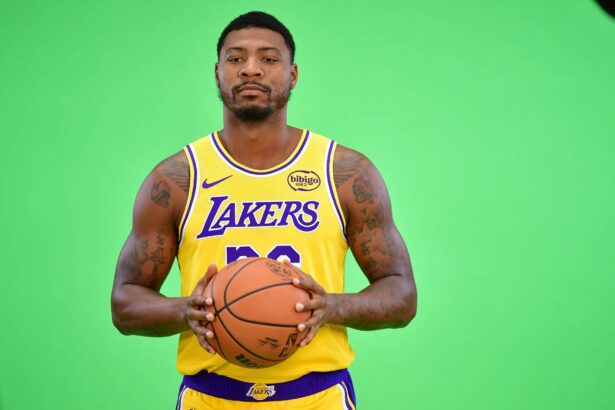 Lakers guard Marcus Smart poses for photos during media day at UCLA Health Training Center