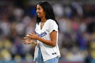 Natalia Bryant, daughter of former Los Angeles Lakers player Kobe Bryant reacts before throwing out the ceremonial first pitch at Dodger Stadium.