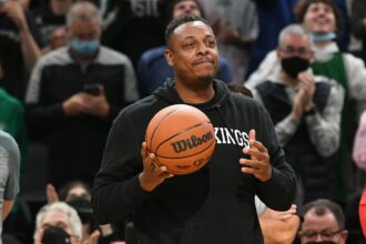 Paul Pierce carries the game ball before a game against the Raptors at the TD Garden
