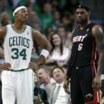Celtics forward Paul Pierce on the court during a break in the first half with Miami Heat forward LeBron James at the TD Garden