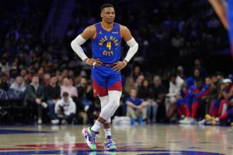 Nuggets guard Russell Westbrook looks on against the 76ers in the first quarter at Wells Fargo Center