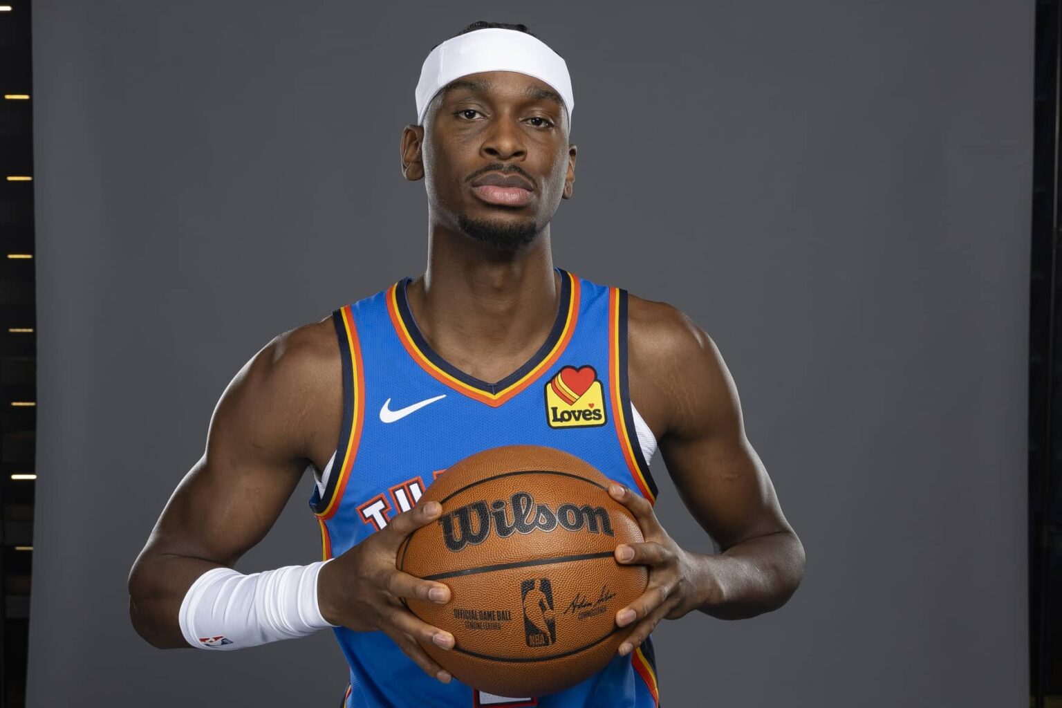 Thunder guard Shai Gilgeous-Alexander poses for a photo during the 2025 Oklahoma City Thunder media day at Paycom Center