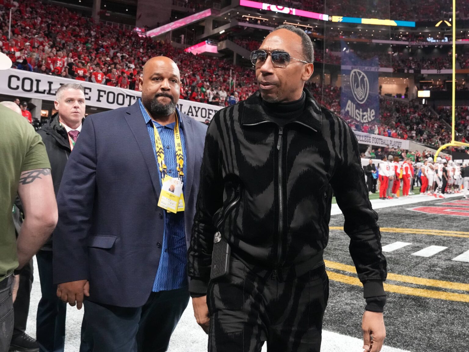 Sports personality Stephen A. Smith arrives before the CFP National Championship college football game between the Notre Dame Fighting Irish and the Ohio State Buckeyes at Mercedes-Benz Stadium.