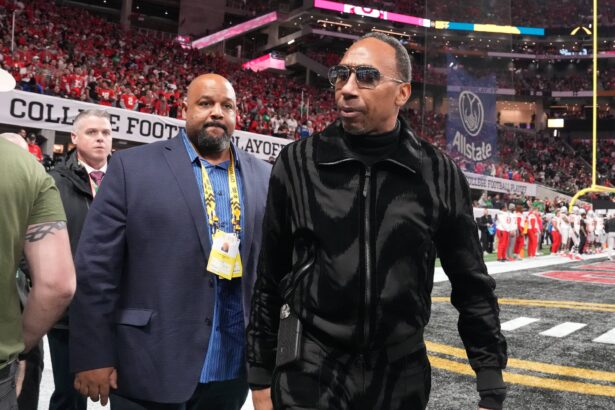 Sports personality Stephen A. Smith arrives before the CFP National Championship college football game between the Notre Dame Fighting Irish and the Ohio State Buckeyes at Mercedes-Benz Stadium.