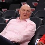 Clippers owner Steve Ballmer sits courtside before the game against the Mavericks at Intuit Dome