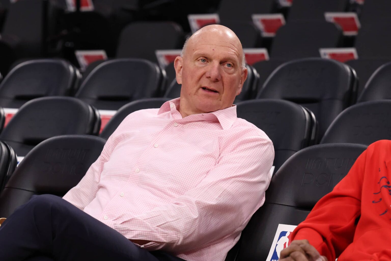 Clippers owner Steve Ballmer sits courtside before the game against the Mavericks at Intuit Dome