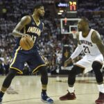 Pacers forward Paul George dribbles againstaaaa Cavaliers forward LeBron James (23) in the second quarter in game one of the first round of the 2017 NBA Playoffs at Quicken Loan