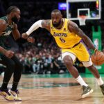 Jan 28, 2023; Boston, Massachusetts, USA; Los Angeles Lakers forward LeBron James (6) drives to the basket defended by Boston Celtics forward Jaylen Brown (7) during the second half at TD Garden. Mandatory Credit: Paul Rutherford-USA TODAY Sports