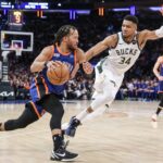 Dec 23, 2023; New York, New York, USA; New York Knicks guard Jalen Brunson (11) looks to drive past Milwaukee Bucks forward Giannis Antetokounmpo (34) in the second quarter at Madison Square Garden. Mandatory Credit: Wendell Cruz-Imagn Images