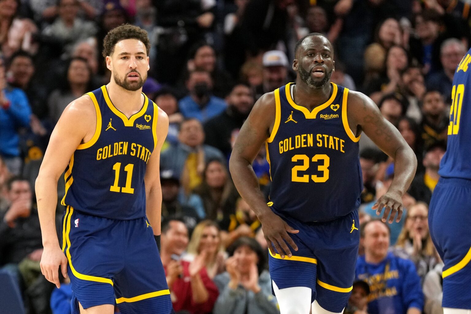 Jan 27, 2024; San Francisco, California, USA; Golden State Warriors guard Klay Thompson (11) and forward Draymond Green (23) during the third quarter against the Los Angeles Lakers at Chase Center. Mandatory Credit: Darren Yamashita-USA TODAY Sports