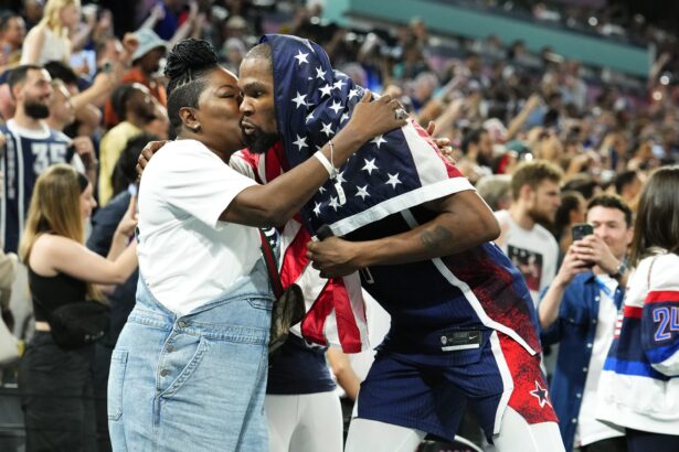 Aug 10, 2024; Paris, France; United States guard Kevin Durant (7) celebrates with his mother Wanda Durant after defeating France in the men's basketball gold medal game during the Paris 2024 Olympic Summer Games at Accor Arena. Mandatory Credit: Rob Schumacher-USA TODAY Sports
