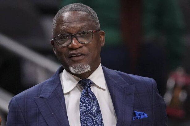 Oct 28, 2024; Atlanta, Georgia, USA; NBA Hall of Fame player Dominique Wilkins on the court before the game between the Atlanta Hawks and the Washington Wizards at State Farm Arena. Mandatory Credit: Dale Zanine-Imagn Images