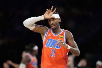 Dec 14, 2024; Las Vegas, Nevada, USA; Oklahoma City Thunder guard Shai Gilgeous-Alexander (2) reacts during the fourth quarter against the Houston Rockets in a semifinal of the 2024 Emirates NBA Cup at T-Mobile Arena. Mandatory Credit: Kyle Terada-Imagn Images