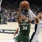 Jan 31, 2025; San Antonio, Texas, USA; Milwaukee Bucks forward Giannis Antetokounmpo (34) drives to the basket while defended by San Antonio Spurs center Victor Wembanyama (1) during the first half at Frost Bank Center. Mandatory Credit: Scott Wachter-Imagn Images