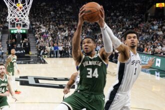 Jan 31, 2025; San Antonio, Texas, USA; Milwaukee Bucks forward Giannis Antetokounmpo (34) drives to the basket while defended by San Antonio Spurs center Victor Wembanyama (1) during the first half at Frost Bank Center. Mandatory Credit: Scott Wachter-Imagn Images