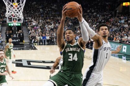 Jan 31, 2025; San Antonio, Texas, USA; Milwaukee Bucks forward Giannis Antetokounmpo (34) drives to the basket while defended by San Antonio Spurs center Victor Wembanyama (1) during the first half at Frost Bank Center. Mandatory Credit: Scott Wachter-Imagn Images