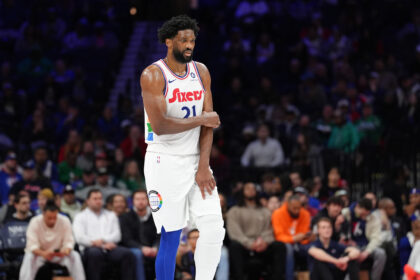Feb 11, 2025; Philadelphia, Pennsylvania, USA; Philadelphia 76ers center Joel Embiid (21) holds his arm after falling against the Toronto Raptors in the second quarter at Wells Fargo Center. Mandatory Credit: Kyle Ross-Imagn Images
