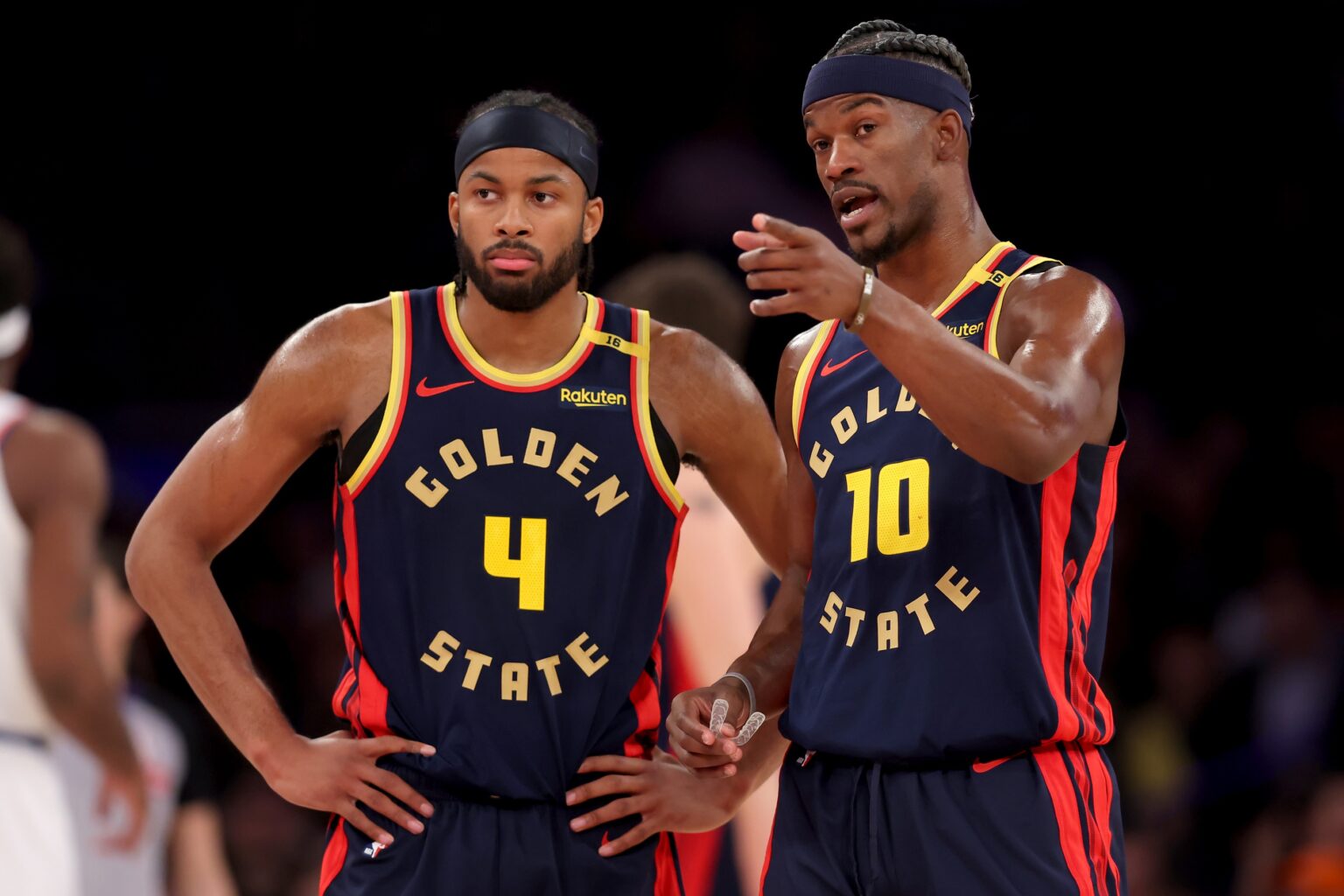 Mar 4, 2025; New York, New York, USA; Golden State Warriors forward Jimmy Butler III (10) talks to guard Moses Moody (4) during the second quarter against the New York Knicks at Madison Square Garden. Mandatory Credit: Brad Penner-Imagn Images