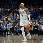 Mar 27, 2025; Orlando, Florida, USA; Orlando Magic forward Paolo Banchero (5) dribbles the ball against the Dallas Mavericks in the third quarter at Kia Center. Mandatory Credit: Jeremy Reper-Imagn Images