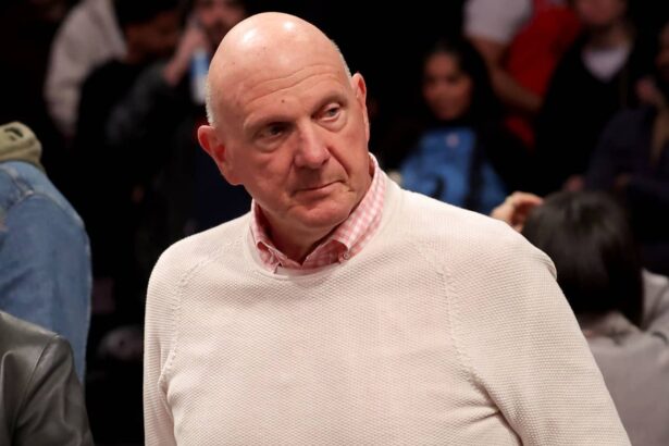 Mar 28, 2025; Brooklyn, New York, USA; Los Angeles Clippers owner Steve Ballmer leaves his court side seat after a game against the Brooklyn Nets at Barclays Center. Mandatory Credit: Brad Penner-Imagn Images