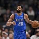 Mar 31, 2025; Dallas, Texas, USA; Dallas Mavericks guard Spencer Dinwiddie (26) in action during the game between the Dallas Mavericks and the Brooklyn Nets at the American Airlines Center. Mandatory Credit: Jerome Miron-Imagn Images