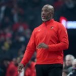 Blazers head coach Chauncey Billups watches from the sideline during the first half against the Spurs at Moda Center
