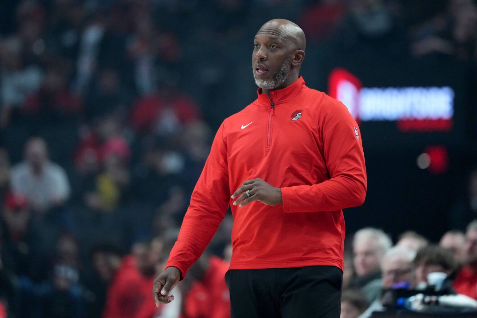 Blazers head coach Chauncey Billups watches from the sideline during the first half against the Spurs at Moda Center